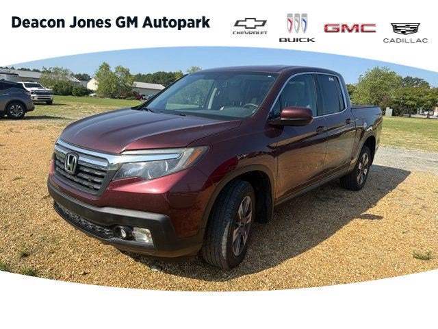 2019 Honda Ridgeline RTL-T in Red — front three-quarter view