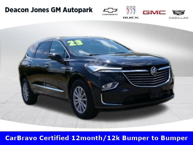 2023 Buick Enclave Essence in Ebony Twilight Metallic — front three-quarter view